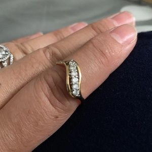 10k gold plated ring with 6 cz stone size 8.